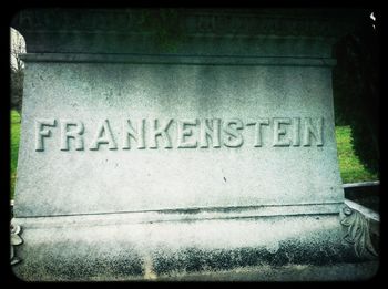 Close-up of text on wall