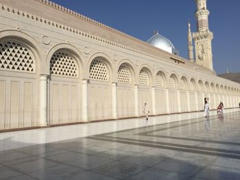 Few people walking in islamic holy city of medina in saudi arabic