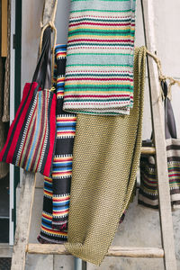 High angle view of multi colored pencils in basket for sale