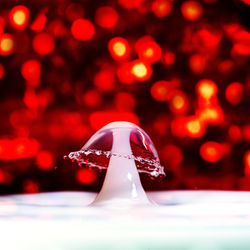 Close-up of illuminated lighting equipment on table