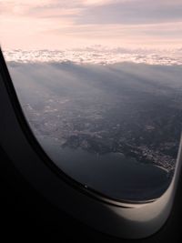 Aerial view of landscape seen through airplane window