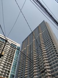 Low angle view of buildings against clear sky