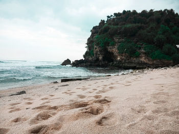 Scenic view of beach against sky