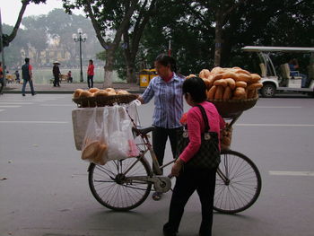 People on road in city