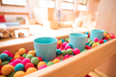 Close-up of multi colored candies on table