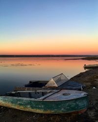 Scenic view of sea against clear sky during sunset