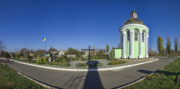 Panoramic shot of building against blue sky