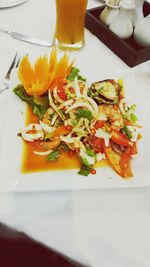 Close-up of served food in plate