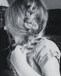 Close-up of girl with braided hair