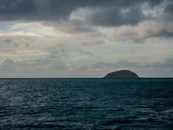 Scenic view of sea against sky at dusk