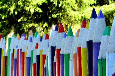 Close-up of multi colored pencils in row