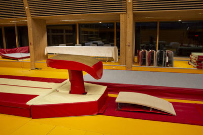 Close-up of chairs and tables in restaurant