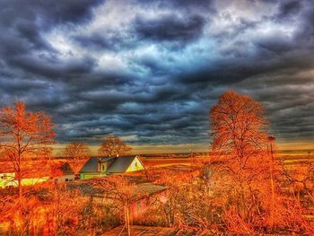 Scenic view of dramatic sky at sunset