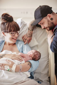 Parents in hospital with newborn baby