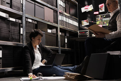 Business colleagues working in cafe