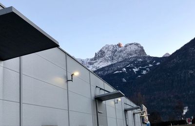 Buildings against clear sky during winter