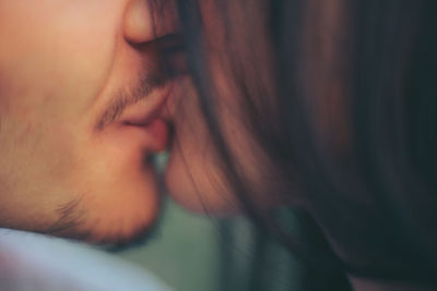 Close-up of couple kissing