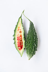 Close-up of strawberry over white background