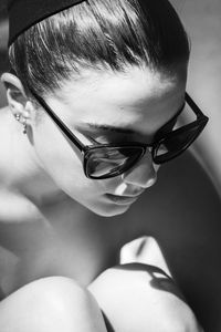 Close-up of young woman wearing sunglasses