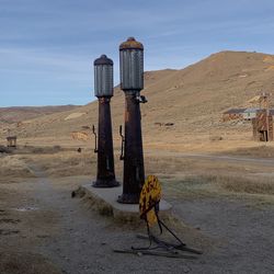 Built structure on arid landscape against sky