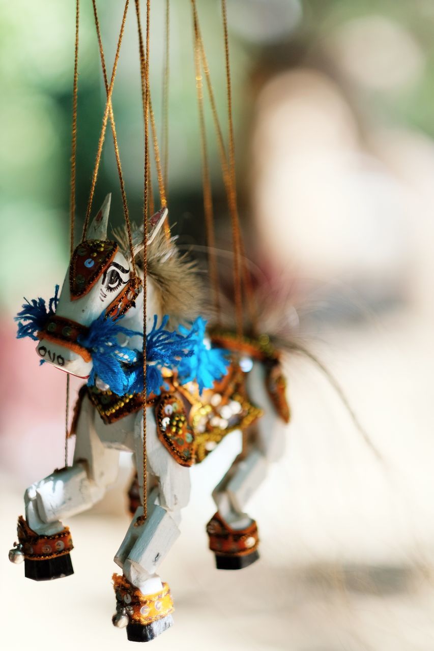 CLOSE-UP OF DECORATIONS ON TABLE