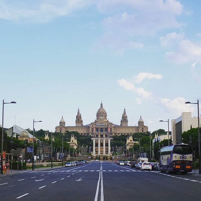 transportation, architecture, car, building exterior, built structure, road, street, land vehicle, mode of transport, sky, city, road marking, incidental people, travel, the way forward, day, outdoors, city life, city street, travel destinations