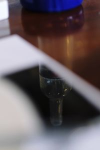 Close-up of wineglass on table