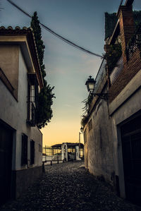 Narrow alley amidst buildings in town