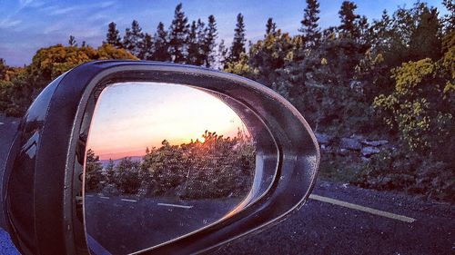 Reflection of car on glass window