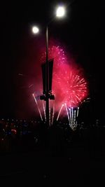 Firework display at night