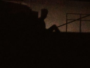 Shadow of man photographing