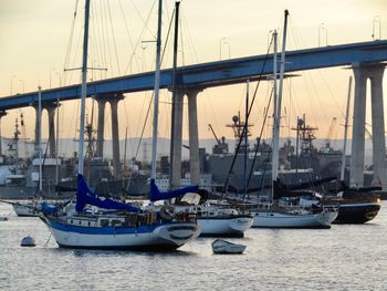 Boats moored at harbor