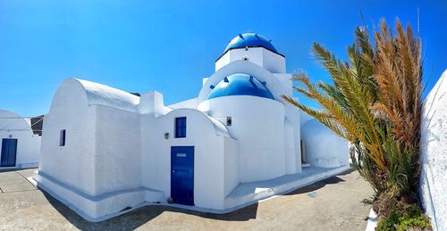 White building against blue sky