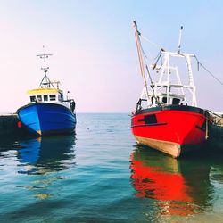 View of sailboat in sea against sky