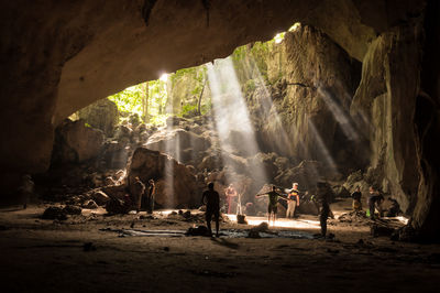 Group of people on rock formation