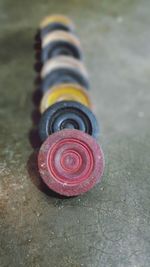Close-up of multi colored pencils on the road