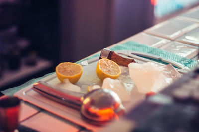 Close-up of fruits in plate on table