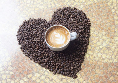 High angle view of coffee cup on table