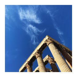 Low angle view of building against blue sky