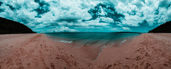 Panoramic view of beach against sky