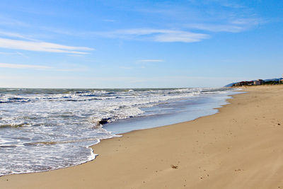 Scenic view of beach against sky