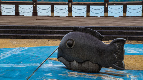 Close-up of horse statue in swimming pool