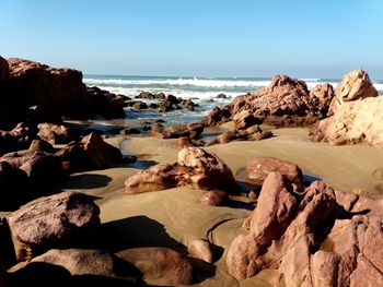 Rocky beach clear sky
