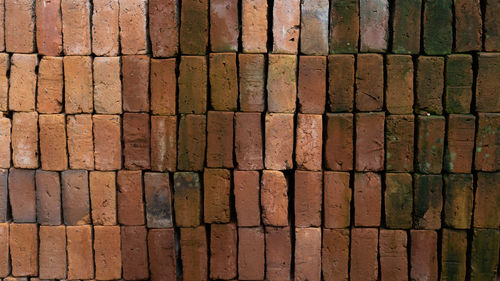 Brick with green moss texture