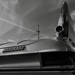 Low angle view of airplane against sky