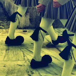 Low section of woman standing on floor