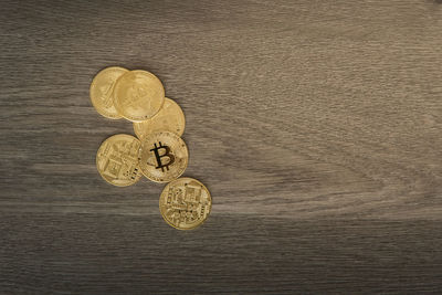 High angle view of coins on table