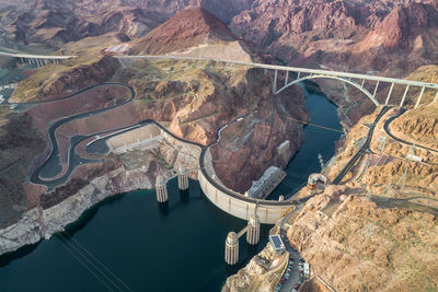 Hoover dam in nevada. mountain and colorado river in background.