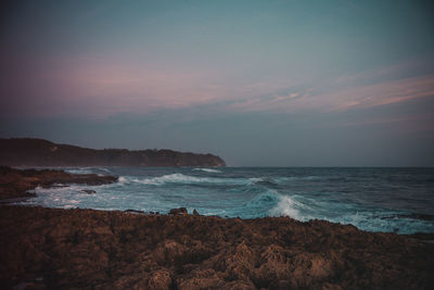 Scenic view of sea against sky during sunset