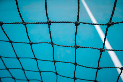 Full frame shot of net against sky